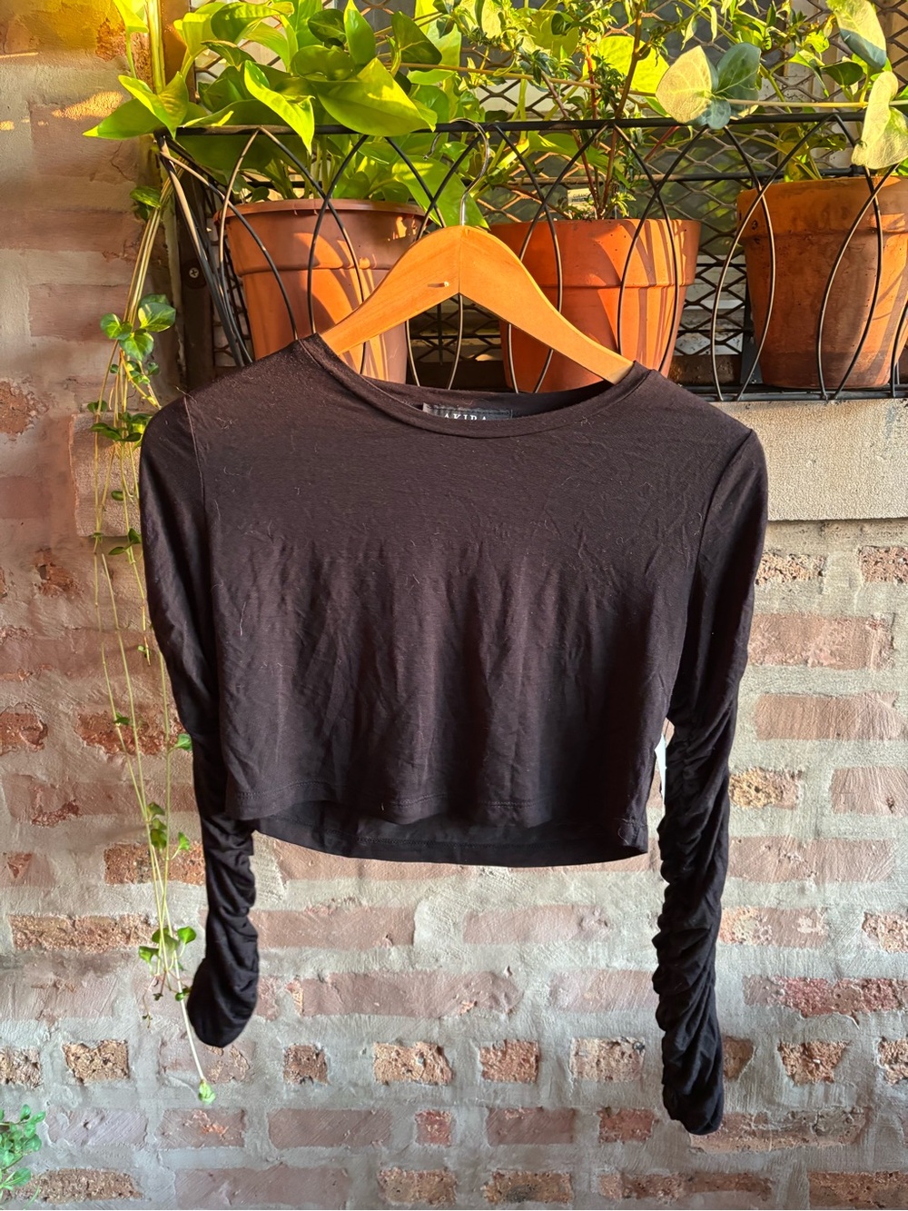 AKIRA Black Long-Sleeve Ruched Crop Top